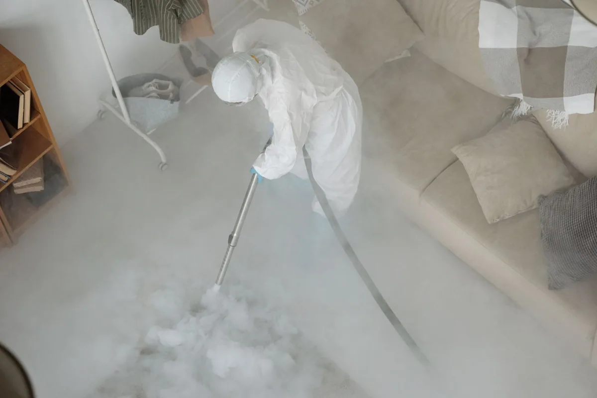 Biohazard cleanup technician in protective equipment, New Tazewell, TN